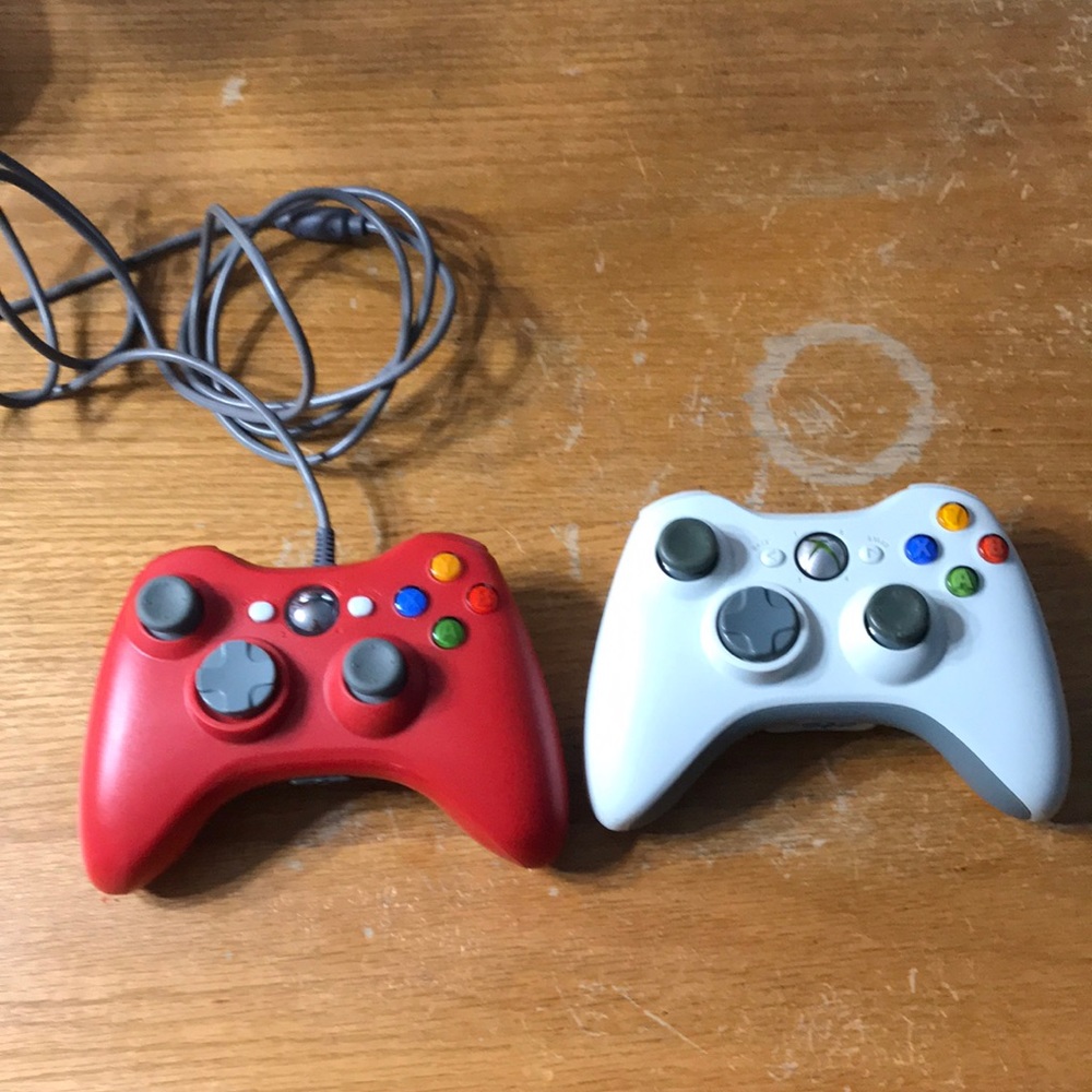 Two Xbox 360 controllers